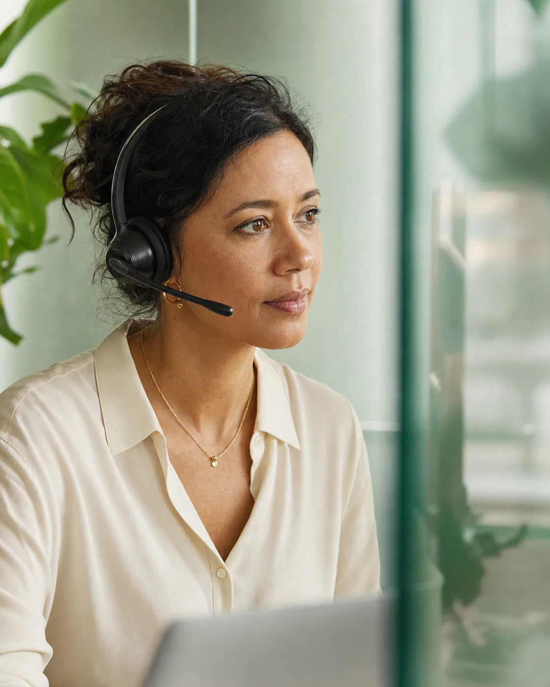 A customer support professional listening attentively